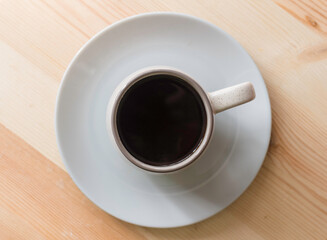 Coffee on a wooded background.Top view.
