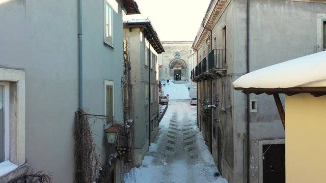 Pescocostanzo, a delightful village in Abruzzo covered in snow
Mountain town with snow. Aerial shot with drone