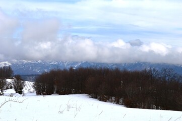 winter landscape of mountains and hills in the snow