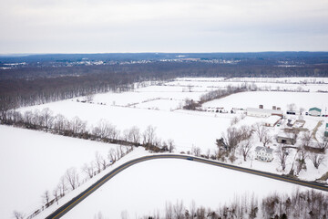 Aerial of Snow Covered Plainsboro Homes Farmland