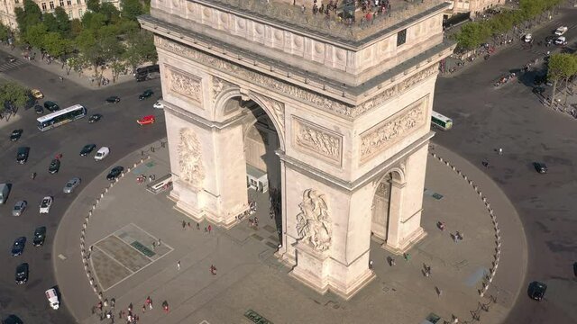 summer day paris city flight over famous triumph arch square traffic circle aerial panorama 4k france