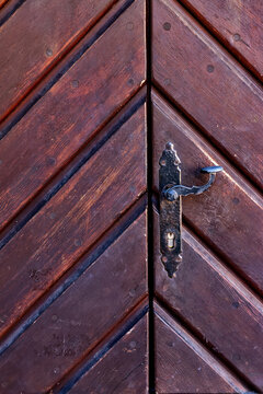 Wooden door with steel handle