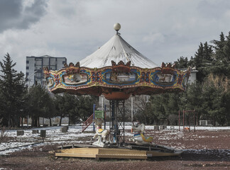 Georgia, Tbilisi. Abandoned rusty playgrounds and attractions.