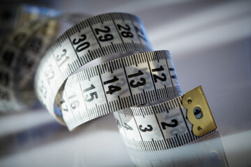 white tape measuring on a white background