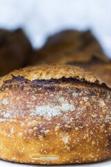 Craft bread on the table at the bakery. The concept of small industries and healthy food