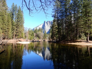 Scenic view of the Merced River that flows through Yosemite National Park, in the Sierra Nevada Mountains, California.