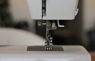 stitching clothing with sewing machine stock photo