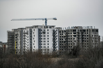 Crane and apartment building under construction