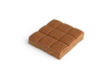 Chocolate toffee candy squares isolated on white background.