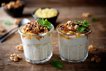 Greek yogurt millet caramelized apple walnuts parfait in a glass