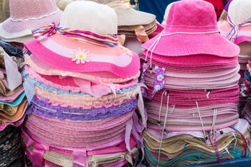 Sun hat stacked up for sale in Pondicherry, Tamil Nadu, India