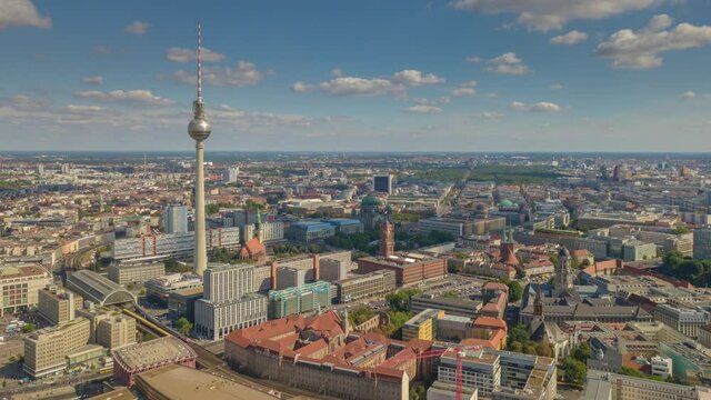 sunny evening flight over berlin cityscape famous tv tower aerial panorama 4k timelapse germany