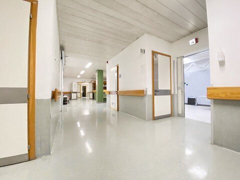 Empty White Color Hospital Clinic Hallway. Nursing Home Or Infirmary Concept