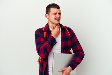 Young caucasian student man holding a laptop isolated on white background suffers pain in throat...