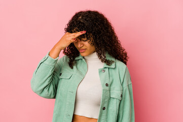 Young african american afro woman isolated having a head ache, touching front of the face.