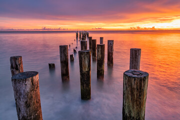 Coastal dreams - old harbour near Naples Pier at sunset, Florida, USA. Travel and beauty of nature concept.