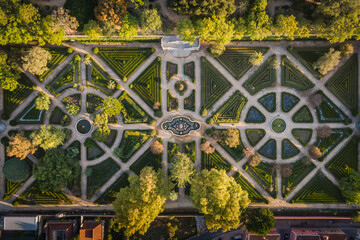 Aerial top down view of the Ajuda Botanical Gardens at sunrise in Lisbon, Portugal.