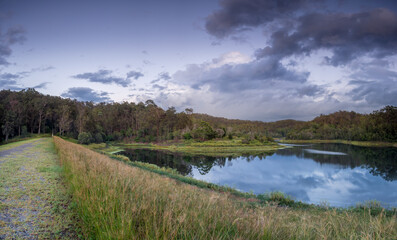 Panoramic Lakeside Morning with Cloud Reflections