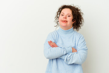Woman with Down syndrome isolated smiling confident with crossed arms. © Asier