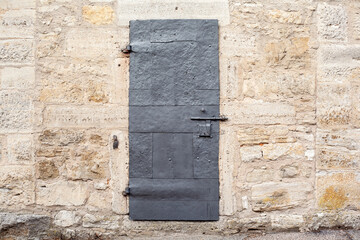 Medieval Dungeon Door on an antique German Castle Wall.