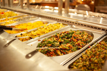 Salad bar with a variety of different healthy salads for self serve