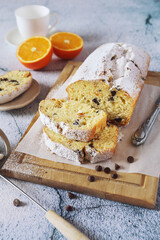 Orange cake with chocolate, powdered sugar dressing
