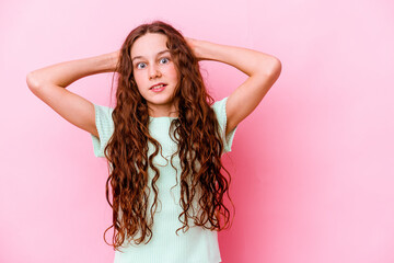 Little caucasian girl isolated on pink background screaming, very excited, passionate, satisfied with something.