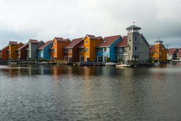 Colourful houses by the lake in the Netherlands