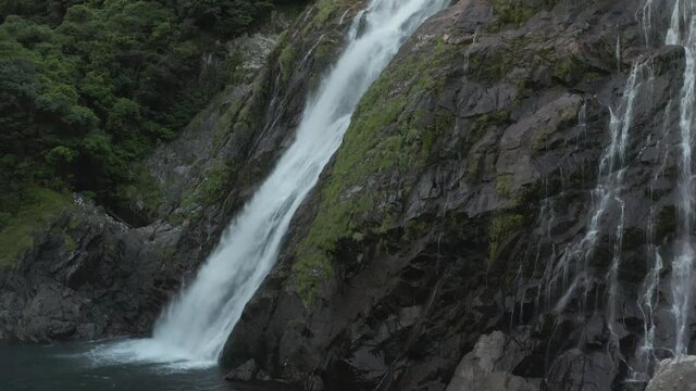 Ohko-no-Taki Falls in Yakushima Japan. Rise Shot revealing Waterfall