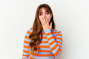 Young caucasian cute woman isolated on white background yawning showing a tired gesture covering mouth with hand.