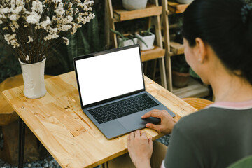 computer screen blank mockup.hand woman work using laptop with white background for advertising,contact business search information on desk at coffee shop.marketing and creative design