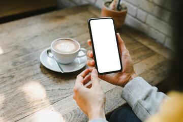 cell phone blank white screen mockup.woman hand holding texting using mobile on desk at office.background empty space for advertise.work people contact marketing business,technology