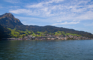 Lake Lucerne, Switzerland. Sailboat sailing on lake.