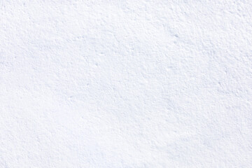 Soft and pure white snow cover the floor in winter, season texture background. Abstract freeze ice detail. Seasonal surface concept.
