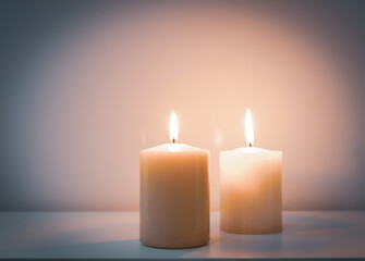 Fototapeta na wymiar still-life with two burning candles
