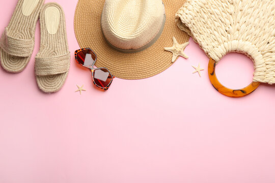 Beach Accessories On Pink Background, Flat Lay. Space For Text