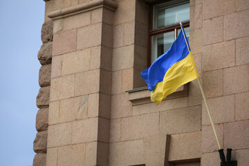 National flag of Ukraine on building facade