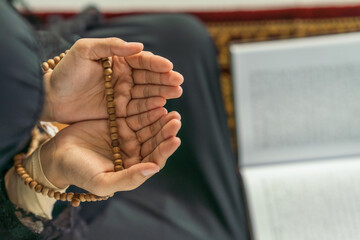 hands of muslim prayer woman with rosary in dua praying for allah blessing