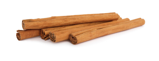 Aromatic dry cinnamon sticks on white background