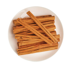 Aromatic dry cinnamon sticks on white background, top view