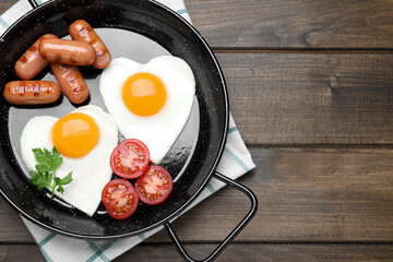 Romantic breakfast on wooden table, top view with space for text. Valentine's day celebration