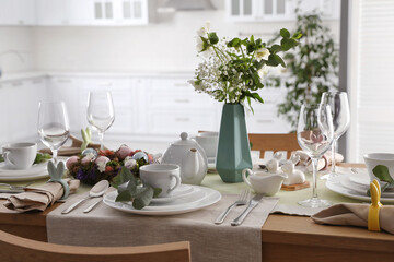 Beautiful Easter table setting with festive decor indoors