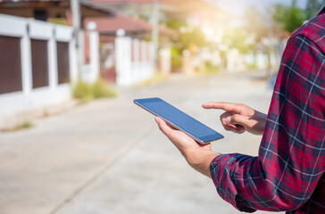 Foreman worker hold with tablet on construction site, Architect man using digital tablet checking project schedule 