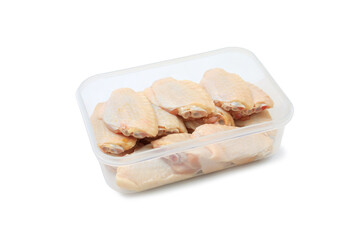 Raw chicken wings in plastic tray packaging isolated on white background with clipping path