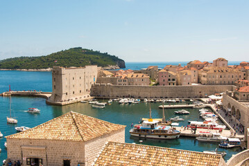 Croatia, Dubrovnik. Walled city old town and marina. St. John Fortress (Sveti Ivan) called Mulo...