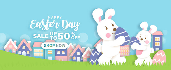 Easter day background and banner with  cute rabbiits and easter eggs.