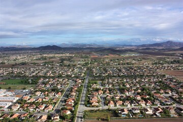 Aerial drone view of rural streets and roads in a residential area of a small town