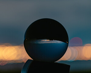 Fototapeta na wymiar Glass Globe and city
