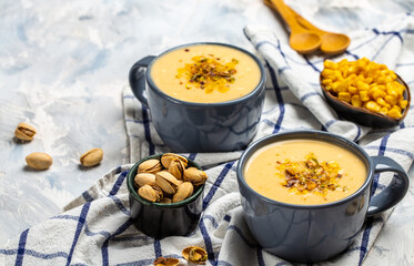 Creamy corn soup with roasted pistachios and croutons, Healthy food. Vegan cuisine. Restaurant menu, dieting, cookbook recipe