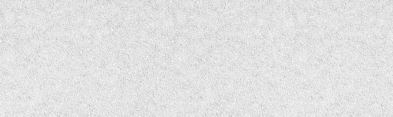 Whitewashed pebble dash wall wide texture. White painted rough stone surface. Large light panoramic...